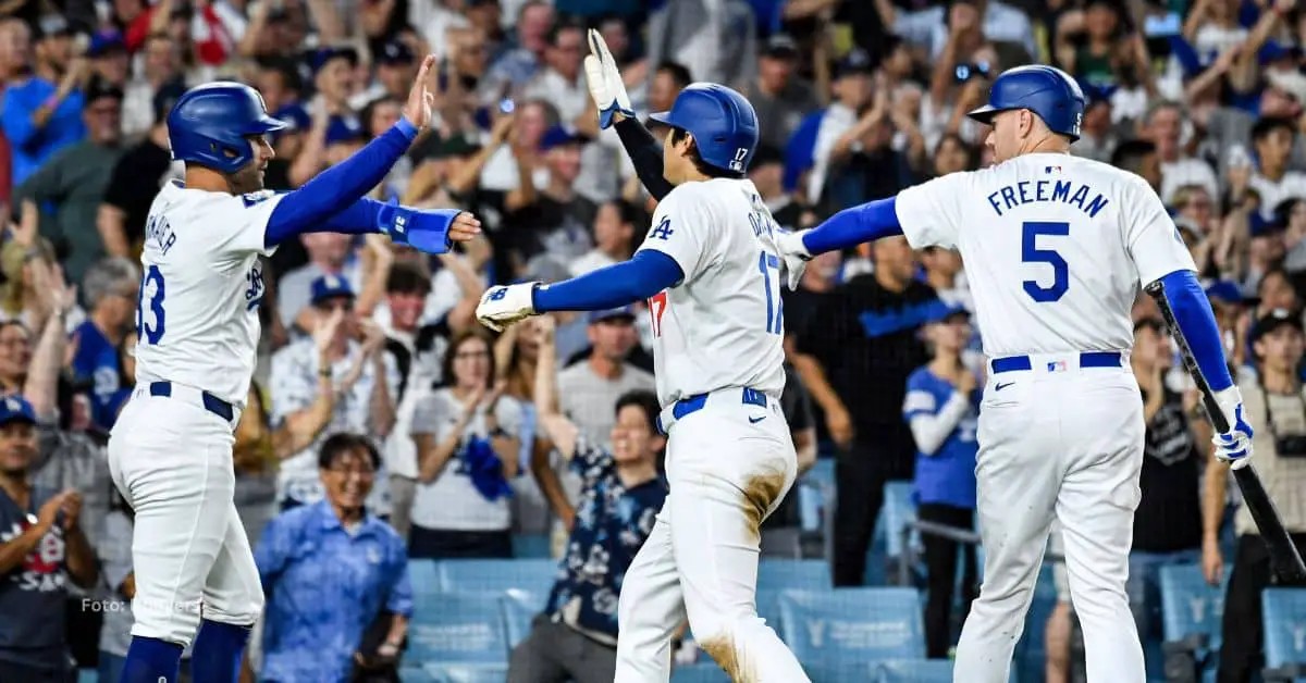 Jugadores de Los Angeles Dodgers celebrando luego de anotar carreras