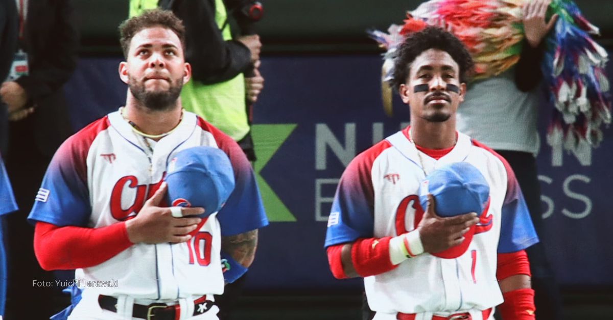 Yoan Moncada y Roel Santos