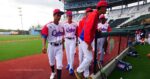 Jugadores del equipo Cuba en la Copa Caribe sub 15 entrando al dugout