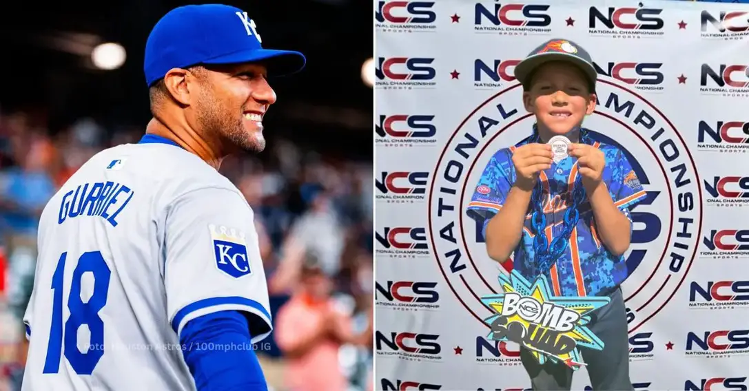 Yuli Gurriel con el uniforme de Kansas City Royals y su hijo con la medalla de líder jonronero