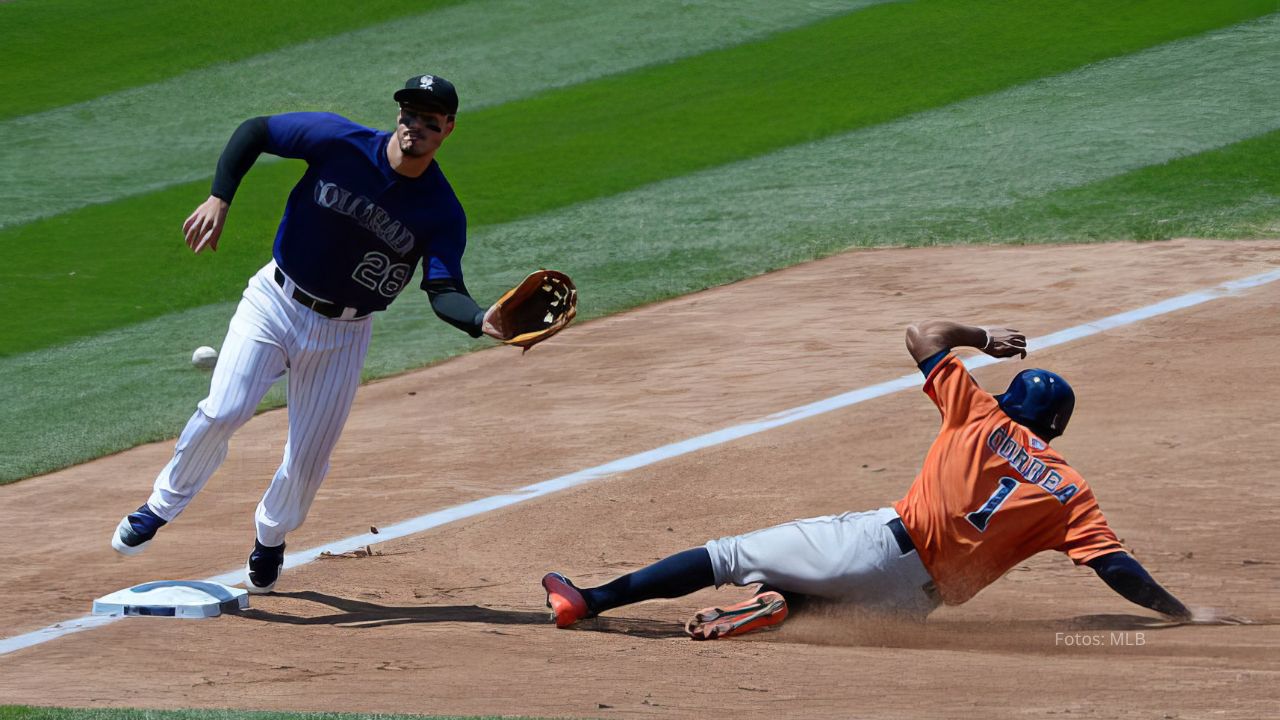 Nolan Arenado y Carlos Correa