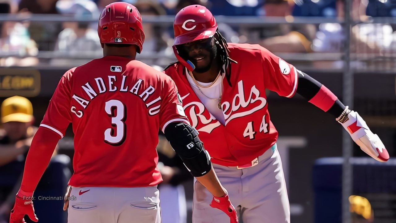 Jeimer Candelario y Elly De La Cruz celebrando un cuadrangular