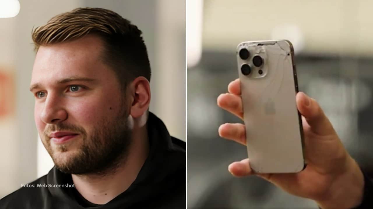 Luka Doncic en una entrevista mostrando su teléfono roto