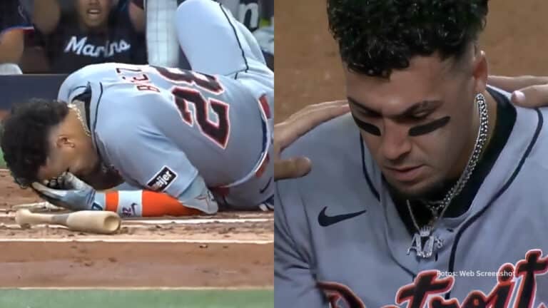 Javier Báez en el suelo tras golpe en un juego con Detroit Tigers