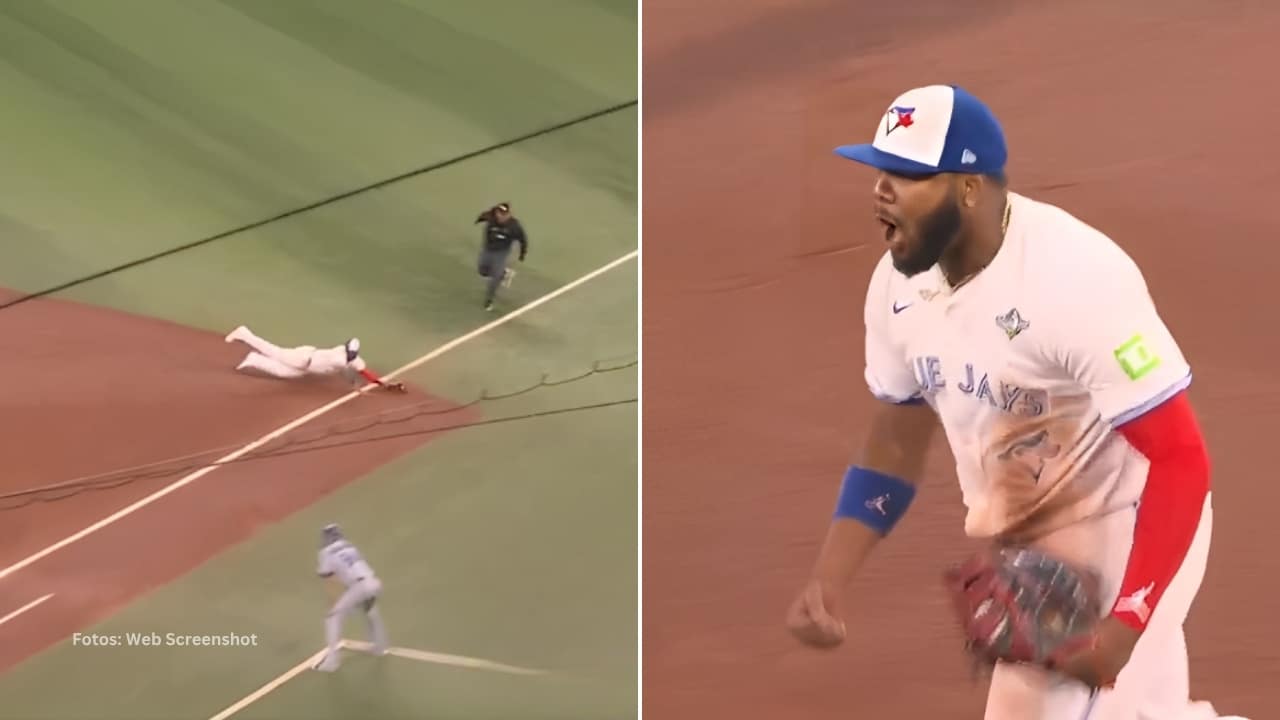 Vladimir Guerrero Jr. lanzándose en la primera y celebrando un out
