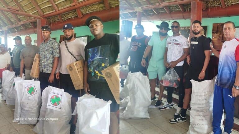 Jugadores de Las Tunas del Beisbol Cubano recibiendo bolsas de carbón