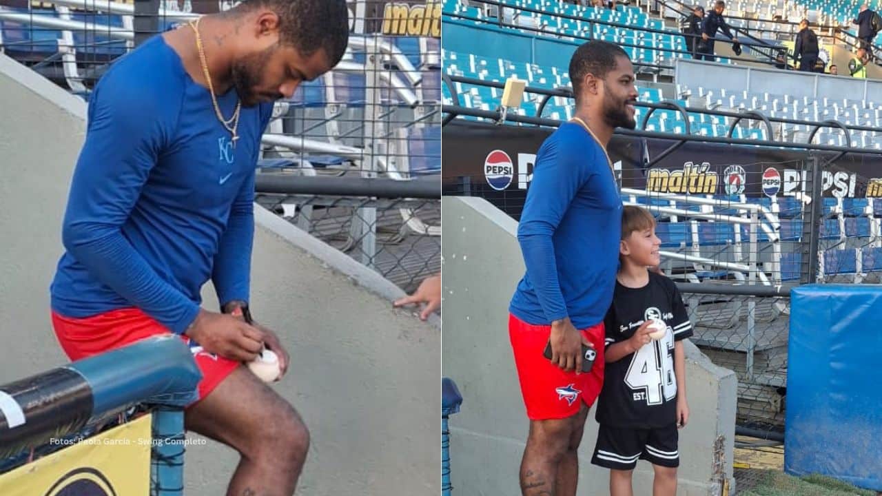 Maikel Garcia firmando autografos